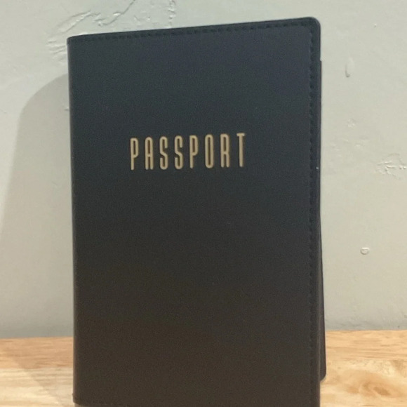 Box set with 2 passport holders. 1 black and 1 white. Brand new in box. - Picture 4 of 11